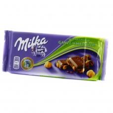 Шоколад Milka молочний з цілим горіхом 100г