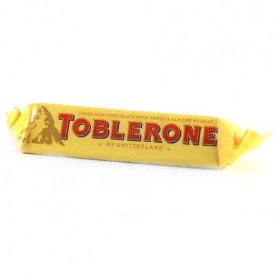 Шоколад Toblerone молочный с медом миндалем и нугой 35 г