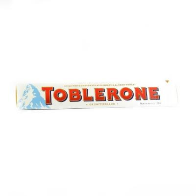 Шоколад Toblerone молочный с медом, миндалем и нугой белый 100г